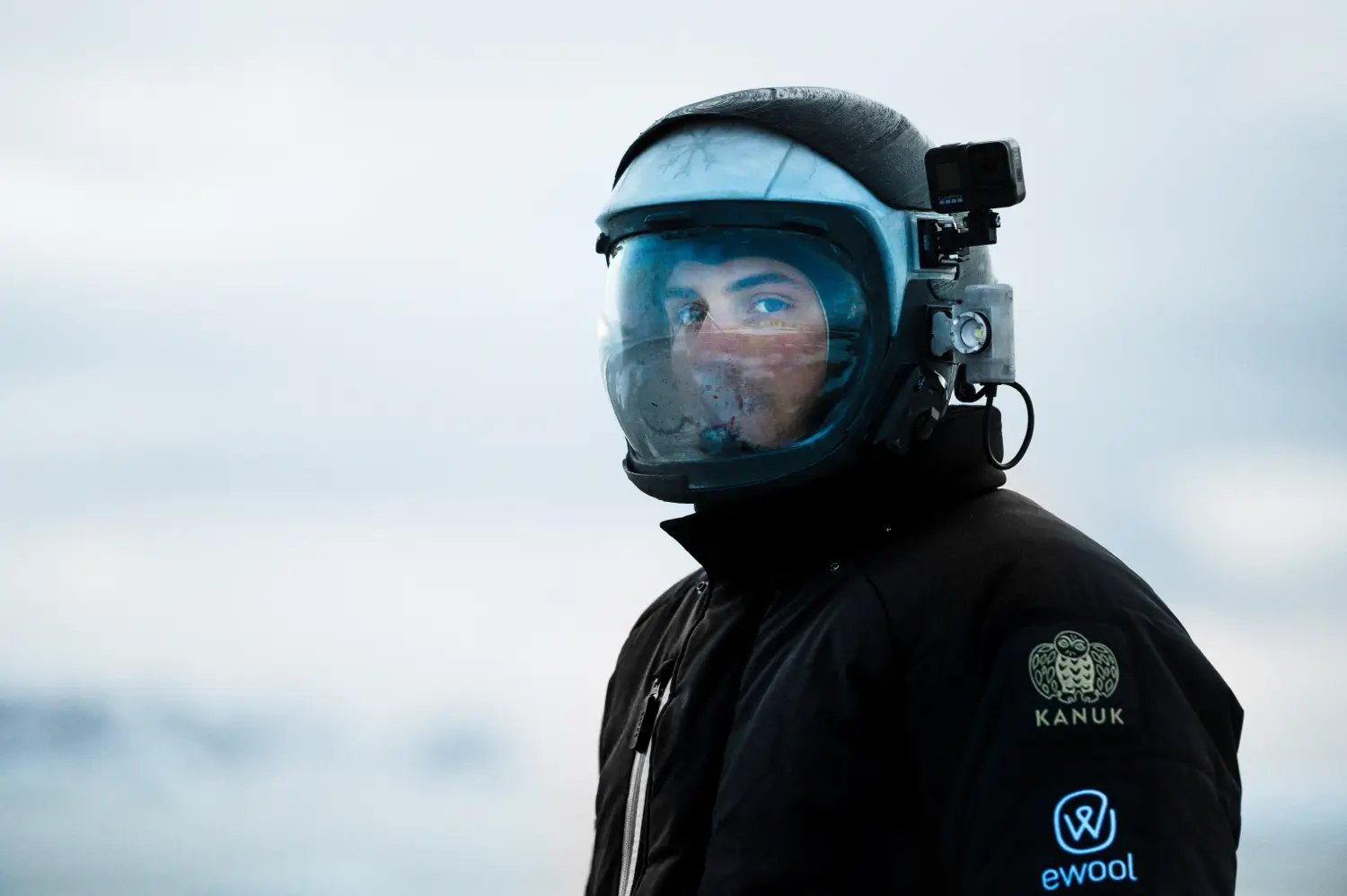 Sebastian standing in his analog space suit on the LUNARK mission